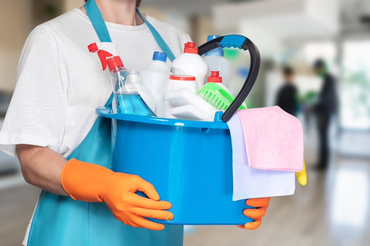 Cleaning supplies in a bucket ready for a commercial cleaning job